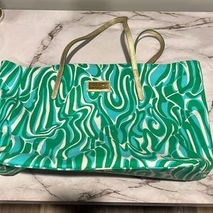 Practically new green and gold Lilly Pulitzer tote. Great for traveling!